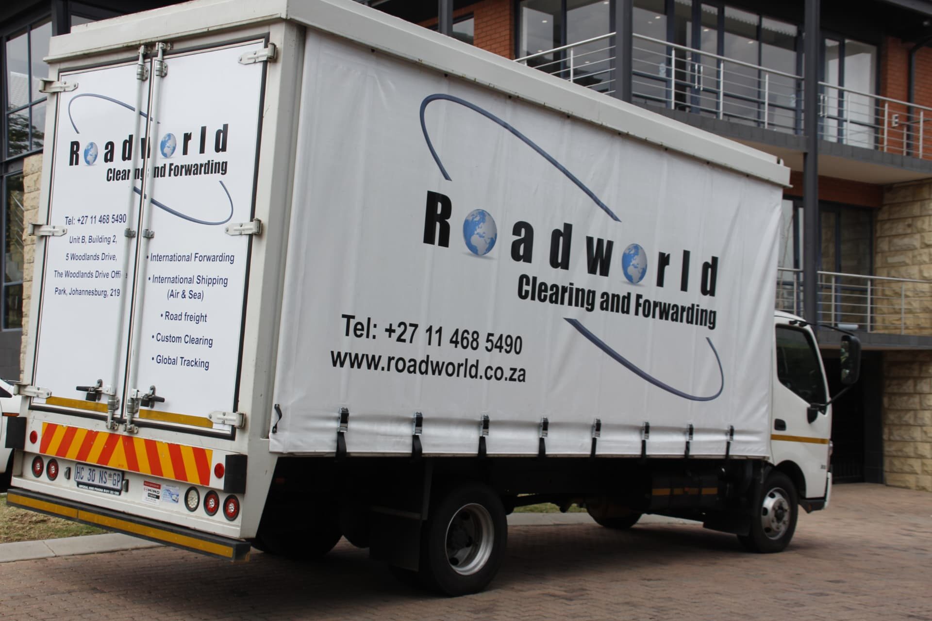 Branded RWCF Roadworld Clearing & Forwarding delivery truck